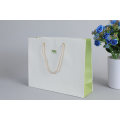 China Supplies Export Coated Paper Bag with Twist Rope Handle